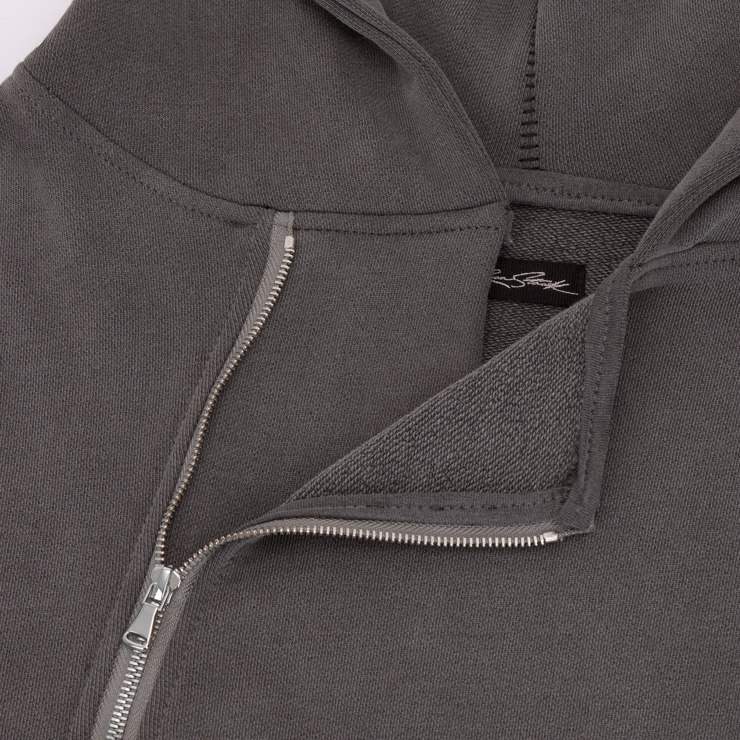 CURVED ZIP-UP HOODIE
